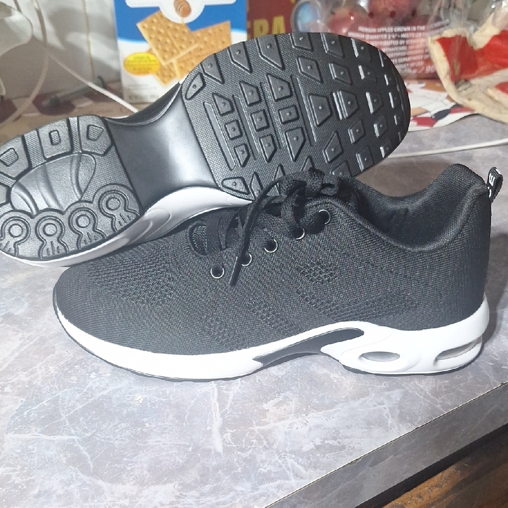 Black and White Sneakers with Air Cushioning and Breathable Design